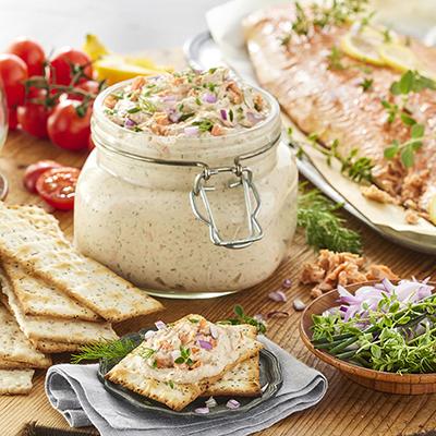 Easter fish recipes with a jar of smoked salmon dip and crackers.