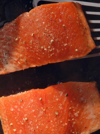 Ode to Copper River Salmon with two filets in a pan.