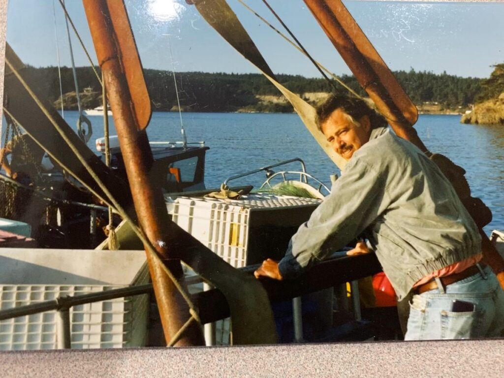 seafood business richard walsh on a boat inspecting seafood