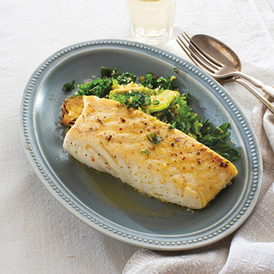 Seafood recipes with a plate of halibut and greens