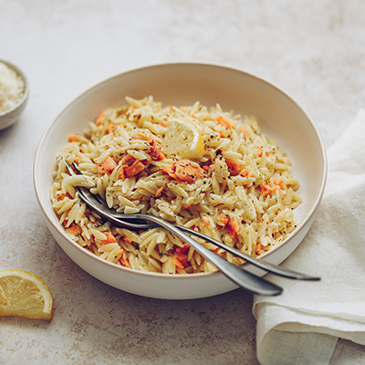 Seafood recipes with a bowl of salmon orzo