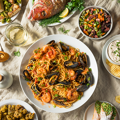 Christmas fish dishes on a table.