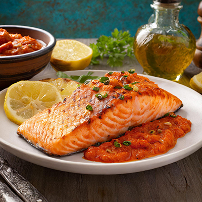 Plate of salmon with romesco fish sauce