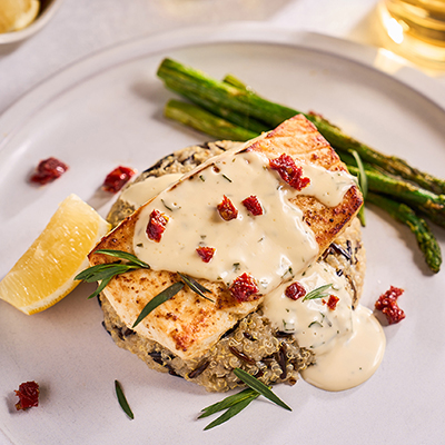 Copper River Seafoods broiled halibut with sauce on plate